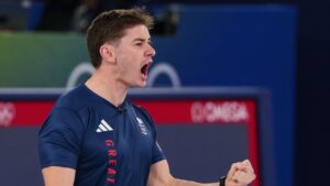 Britain's Grant Hardie reacts during a men's curling gold medal match between Britain and Canada, at the 2026 Winter Olympics, in Cortina d'Ampezzo, Italy, Saturday, Feb. 21, 2026. (Misper Apawu/AP)