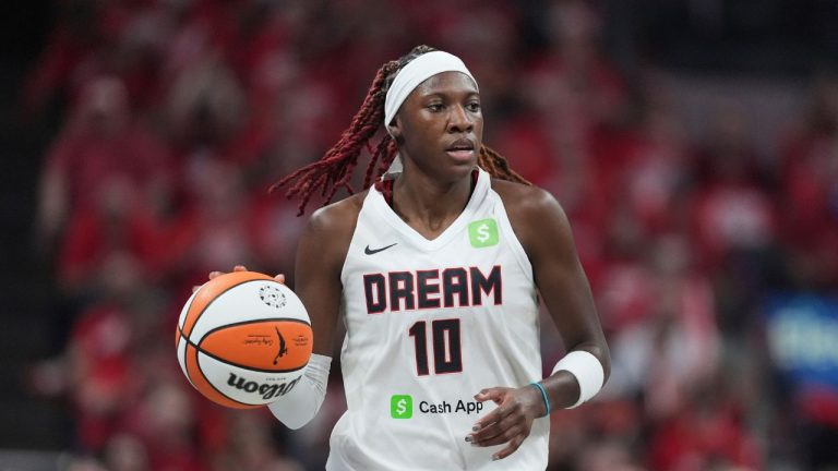 Atlanta Dream guard Rhyne Howard (10) plays against the Indiana Fever in the first half of a WNBA basketball playoff game in Indianapolis, Tuesday, Sept. 16, 2025. (Michael Conroy/AP Photo)