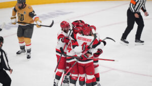 Members of the Carolina Hurricanes celebrate a goal by centre Jordan Staal as Vegas Golden Knights defenseman Brayden McNabb, left, skates away during the first period in Game 4 of the NHL hockey Stanley Cup Final series Tuesday, June 9, 2026, in Las Vegas. (Candice Ward/AP)