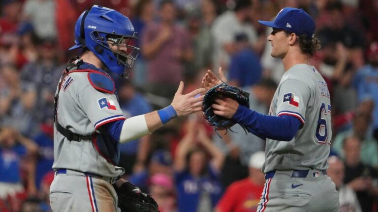 Texas Rangers pitcher Jacob Latz, right, and catcher Danny Jansen celebrate a victory over the St. Louis Cardinals following a baseball game Monday, June 1, 2026, in St. Louis. (Jeff Roberson/AP)