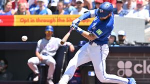 Toronto Blue Jays infielder Nathan Lukes (38) hits a single against the Texas Rangers during first inning MLB baseball action in Toronto on Sunday June 28, 2026. (Jon Blacker/CP)
