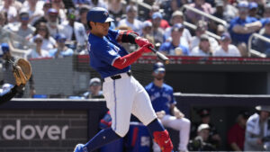 Toronto Blue Jays' Kazuma Okamoto (7) hits a solo home run against the New York Yankees during third inning MLB baseball action in Toronto, Saturday, June 13, 2026. (Frank Gunn/CP)