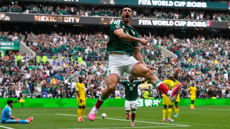 Mexico's Raul Jimenez celebrates after scoring his side's second goal during the World Cup Group A soccer match between Mexico and South Africa in Mexico City, Thursday, June 11, 2026. (Natacha Pisarenko/AP)