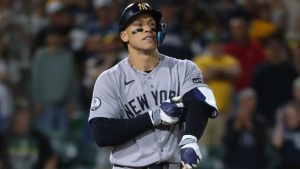 New York Yankees' Aaron Judge reacts after drawing a bases loaded walk to score a run during the ninth inning of a baseball game against the Athletics Saturday, May 30, 2026, in West Sacramento, Calif. (Scott Marshall/AP)