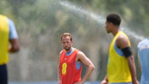 England forward Harry Kane stands near sprinklers during a training session for the national soccer team in Palm Beach Gardens, Fla., Tuesday, June 2, 2026, ahead of the World Cup soccer tournament. (Rebecca Blackwell/AP)