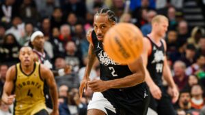 Los Angeles Clippers forward Kawhi Leonard (2) looks for a loose ball during during second half NBA basketball action against the Toronto Raptors, in Toronto on Friday, January 26, 2024. (Christopher Katsarov/CP)