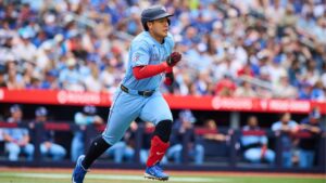 Toronto Blue Jays' Kazuma Okamoto (7) sprints to first base as he grounds into a force out against the Baltimore Orioles during second inning MLB baseball action in Toronto, on Sunday, June 7, 2026. (Sammy Kogan/CP)