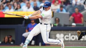 Toronto Blue Jays' Sean Keys (20) strikes out against the New York Mets during first inning MLB baseball action in Toronto on Tuesday, June 30, 2026. (Nathan Denette/CP)