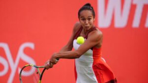 Canada's Leylah Fernandez returns a shot against Britain's Katie Boulter during the HSBC Championship tennis tournament at The Queen's Club, June 8, 2026, in London. (Adam Davy/PA via AP)