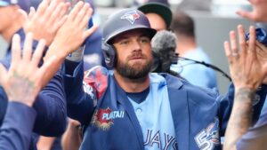 Toronto Blue Jays' Nathan Lukes (38) celebrates in the dug out after hitting a solo home run against the Houston Astros during first inning MLB baseball action in Toronto on Wednesday, June 24, 2026. (Chris Young/THE CANADIAN PRESS)