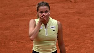 Poland's Maja Chwalinska reacts after winning the quarterfinal tennis match against Russia's Anna Kalinskaya at the French Open in Paris, Wednesday, June 3, 2026. (Emma Da Silva/AP)