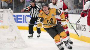 Vegas Golden Knights right wing Mitch Marner, left, celebrates his goal as Carolina Hurricanes defenseman Sean Walker, right, skates behind during the second period in Game 3 of the NHL hockey Stanley Cup Final series, Saturday, June 6, 2026, in Las Vegas. (John Locher/AP)