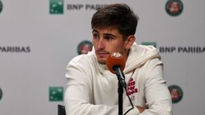 Italy's Matteo Arnaldi holds a press conference after withdrawing from a semifinal match due to an injury at the French Open in Paris, Friday, June 5, 2026. (Thibault Camus/AP)