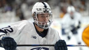 Penn State's Gavin McKenna looks for the puck during the first period of an NCAA college hockey game against Arizona State, (Rick Scuteri/AP)