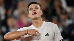 Czechia's Jakub Mensik reacts after winning the quarterfinal tennis match against Brazil's Joao Fonseca at the French Open in Paris, Tuesday, June 2, 2026. (Emma Da Silva/AP Photo)