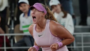 Russia's Mirra Andreeva reacts after winning during the semifinal tennis match against Ukraine's Marta Kostyuk at the French Open in Paris, Thursday, June 4, 2026. (Thibault Camus/AP)