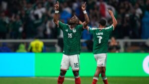 Mexico's Julian Quinones, left, celebrates with Luis Romo after scoring his side's opening goal during the World Cup round of 32 soccer match against Ecuador in Mexico City, Tuesday, June 30, 2026. (Ricardo Mazalan/AP)