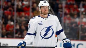 Tampa Bay Lightning's Darren Raddysh (43) watches the puck against the Carolina Hurricanes during the third period of an NHL hockey game in Raleigh, N.C., Thursday, Feb. 26, 2026. (Karl DeBlaker/AP)