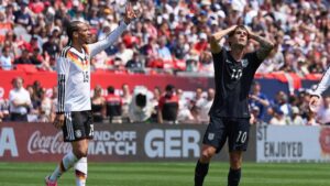 United States forward Christian Pulisic, right, reacts after a missed a shot as Germany forward Leroy Sané celebrates during the first half of an international friendly soccer match in Chicago, Saturday, June 6, 2026. (Nam Y. Huh/AP)