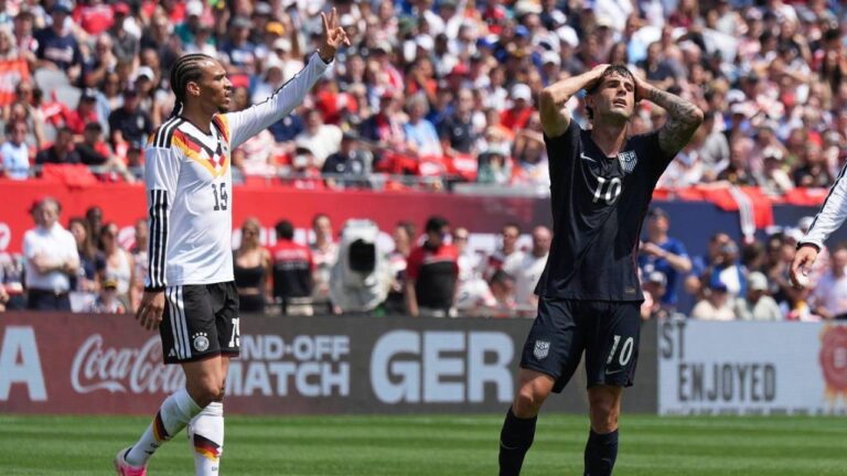 United States forward Christian Pulisic, right, reacts after a missed a shot as Germany forward Leroy Sané celebrates during the first half of an international friendly soccer match in Chicago, Saturday, June 6, 2026. (Nam Y. Huh/AP)