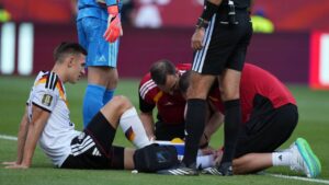 Germany's Nico Schlotterbeck receives treatment following an injury during the World Cup Group E soccer match between Germany and Ivory Coast in Toronto, Saturday, June 20, 2026. (Stephanie Scarbrough/AP)