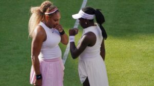 Serena Williams of the United States, left, talks to playing partner Victoria Mboko of Canada as they play against Nicole Melichar-Martinez of Canada and Erin Routliffe of New Zealand during their first round doubles match at the Queen's Club tennis championships in London, Tuesday, June 9, 2026. (Alberto Pezzali/AP)