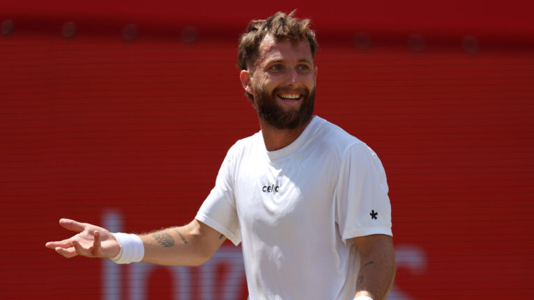 Corentin Moutet of France reacts during his match against Alejandro Davidovich Fokina of Spain on day eleven of the Tennis Championships at The Queen's Club, in London, Thursday, June 18, 2026. (Steven Paston/PA via AP)