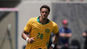 Australia forward Tete Yengi runs during the second half of an international friendly soccer game against Switzerland Saturday, June 6, 2026, in San Diego. (Gregory Bull/AP)