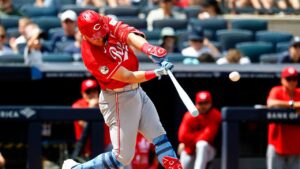 Cincinnati Reds' Tyler Stephenson hits a three-run home run against the New York Yankees during the fourth inning of a baseball game, Sunday, June 21, 2026, in New York. (Noah K. Murray/AP)