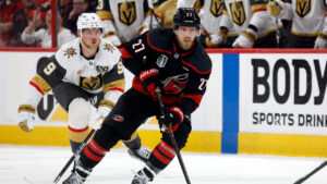 Carolina Hurricanes' Nikolaj Ehlers (27) controls the puck while followed by Vegas Golden Knights' Jack Eichel (9) during the second period in Game 2 of the NHL hockey Stanley Cup Final series in Raleigh, N.C., Thursday, June 4, 2026. (Karl DeBlaker/AP)