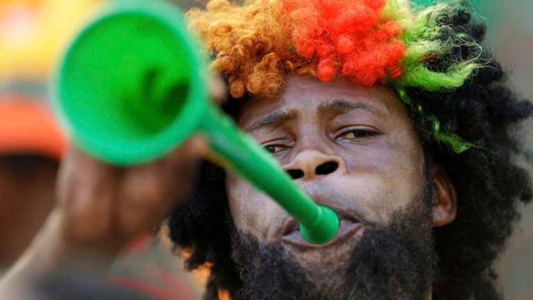A Zambia supporter blows a vuvuzela in the stands while waiting for the start of the African Cup of Nations group C match between Zambia and Nigeria Friday, Jan. 25 2013 at the Mbombela stadium in Nelspruit, South Africa. The two other teams in group C are Ethiopia and Burkina Faso. (Armando Franca/AP Photo)