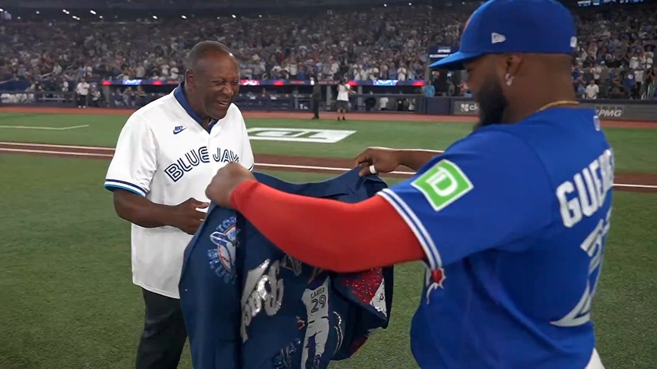 Joe Carter tosses first pitch, wears home run jacket in honour of 50th season