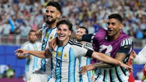Argentina's Julian Alvarez (9) celebrates after scoring his side's second goal during the World Cup quarterfinal soccer match against Switzerland in Kansas City, Mo., Saturday, July 11, 2026. (AP Photo/Charlie Riedel)