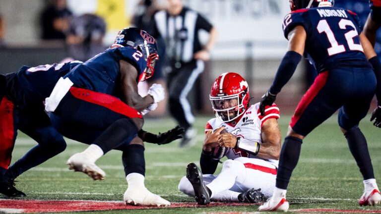 Calgary Stampeders quarterback Vernon Adams Jr. (3) slides during CFL football action against Montreal Alouettes in Montreal on Saturday, July 11, 2026. (Christopher Katsarov/AP)