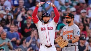 Boston Red Sox's Wilyer Abreu, left, celebrates after his RBI double in the third inning of a baseball game against the Baltimore Orioles, Monday, July 20, 2026, in Boston. (Charles Krupa/AP)