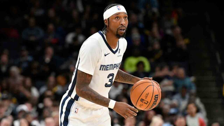 Memphis Grizzlies guard Kentavious Caldwell-Pope (3) plays in the first half of an NBA basketball game against the Denver Nuggets Monday, Nov. 24, 2025, in Memphis, Tenn. (Brandon Dill/AP)