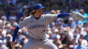 Toronto Blue Jays pitcher Kevin Gausman throws the ball against the Chicago Cubs during the first inning of a baseball game Friday, June 19, 2026, in Chicago. (AP Photo/David Banks)
