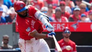 Toronto Blue Jays' Vladimir Guerrero Jr. hits a double off of New York Mets pitcher Freddy Peralta during first inning MLB baseball action in Toronto on Wednesday, July 1, 2026. (Frank Gunn/CP)