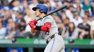 Toronto Blue Jays' Kazuma Okamoto follows through on a single against the Seattle Mariners during the third inning of a baseball game, Friday, July 3, 2026, in Seattle. (Lindsey Wasson/AP)