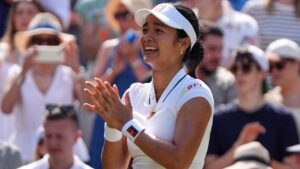 Alexandra Eala of the Philippines celebrates winning the third round women's singles match against Iga Swiatek of Poland at the Wimbledon Tennis Championships in London, Saturday, July 4, 2026.(AP Photo/Maja Smiejkowska)