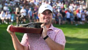Chris Gotterup holds the trophy after winning the John Deere Classic golf tournament, Sunday, July 5, 2026, in Silvis, Ill. (Matt Marton/AP)