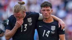 United States' Sebastian Berhalter, right, and Tim Ream react after the United States lost a World Cup round of 16 soccer match against Belgium in Seattle, Monday, July 6, 2026. (Abbie Parr/AP)