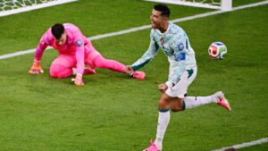 Portugal's Cristiano Ronaldo (7) celebrates a goal against Croatia goalkeeper Dominik Livakovic (1) on a penalty kick during the second half of a World Cup round of 32 soccer match, in Toronto on Thursday, July 2, 2026. (Sammy Kogan/CP)