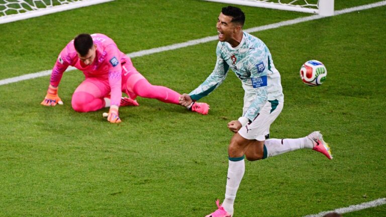 Portugal's Cristiano Ronaldo (7) celebrates a goal against Croatia goalkeeper Dominik Livakovic (1) on a penalty kick during the second half of a World Cup round of 32 soccer match, in Toronto on Thursday, July 2, 2026. (Sammy Kogan/CP)
