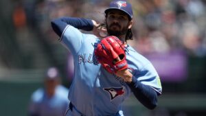 Toronto Blue Jays pitcher Dylan Cease throws against the San Francisco Giants during the fifth inning of a baseball game Wednesday, July 8, 2026, in San Francisco. (AP Photo/Jeff Chiu)