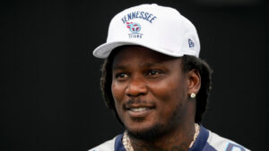 Former Tennessee Titans running back Chris Johnson visits the field during the second half of an NFL football game against the New York Jets, Sept. 15, 2024, in Nashville, Tenn. (George Walker IV/AP)