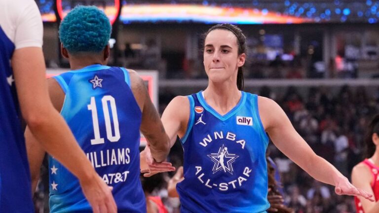 Team Spoon's Caitlin Clark, right, celebrates with Courtney Williams (10) after their team defeated Team Coop in a WNBA All-Star basketball game in Chicago, Saturday, July 25, 2026. (Nam Y. Huh/AP)