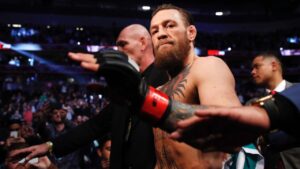 Conor McGregor walks out of the arena after a UFC fight in Las Vegas. (John Locher/AP)