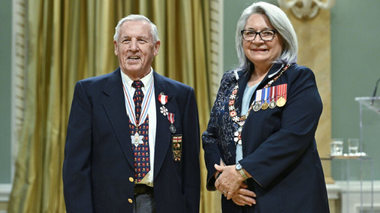 Donald Duguid of Winnipeg is invested as a member of the Order of Canada by Gov. Gen. Mary Simon during a ceremony at Rideau Hall in Ottawa, on Thursday, Oct. 20, 2022. (Justin Tang/CP)