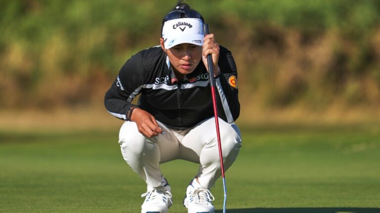 Jeeno Thitikul, of Thailand, lines her putt on the 17th green during the first round of the Women's British Open golf championship in Lytham St Annes, England, Thursday, July 30, 2026. (Jon Super/AP)